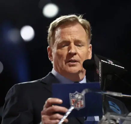 Roger Goodell reading NFL cue card
