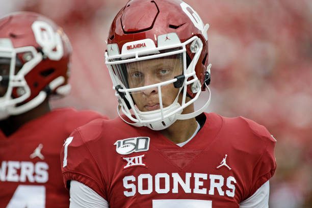 NORMAN, OK - SEPTEMBER 28:  Quarterback Spencer Rattler #7 of the Oklahoma Sooners warms up before the game against the Texas Tech Red Raiders at Gaylord Family Oklahoma Memorial Stadium on September 28, 2019 in Norman, Oklahoma. The Sooners defeated the Red Raiders 55-16. (Photo by Brett Deering/Getty Images)