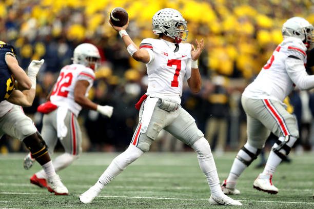 ANN ARBOR, MICHIGAN - NOVEMBER 27: C.J. Stroud #7 of the Ohio State Buckeyes throws a pass in the second half of the game against the Michigan Wolverines at Michigan Stadium on November 27, 2021 in Ann Arbor, Michigan. (Photo by Mike Mulholland/Getty Images)