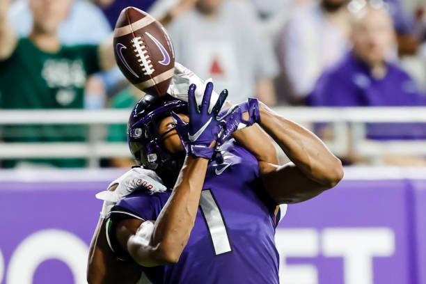 FORT WORTH, TX - SEPTEMBER 04: TCU Horned Frogs wide receiver Quentin Johnston (1) fights for a pass during the game between the TCU Horned Frogs and the Duquesne Dukes on September 4, 2021 at Amon G. Carter Stadium in Fort Worth, Texas. (Photo by Matthew Pearce/Icon Sportswire via Getty Images)