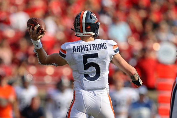 LOUISVILLE, KY - OCTOBER 09: Virginia Cavaliers quarterback Brennan Armstrong (5) throws a pass during the first quarter of the college football game between the Virginia Cavaliers and Louisville Cardinals on October 9, 2021, at Cardinal Stadium in Louisville, KY. (Photo by Frank Jansky/Icon Sportswire via Getty Images)