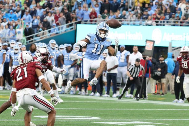 CHARLOTTE, NC - DECEMBER 30: Josh Downs (11) wide receiver of North Carolina misses a pass thrown his way during the Dukes Mayo Bowl college football game between the North Carolina Tar Heels and the South Carolina Gamecocks on December 30, 2021 at Bank of America Stadium in Charlotte, N.C. (Photo by John Byrum/Icon Sportswire via Getty Images)