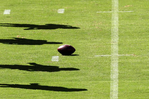 PHILADELPHIA, PENNSYLVANIA - SEPTEMBER 20: The Philadelphia Eagles defense casts a shadow on the football against the Los Angeles Rams offense in the first half at Lincoln Financial Field on September 20, 2020 in Philadelphia, Pennsylvania. (Photo by Rob Carr/Getty Images)