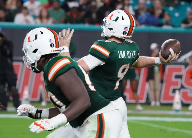 MIAMI GARDENS, FLORIDA - NOVEMBER 20: Tyler Van Dyke #9 of the Miami Hurricanes throws a pass for a touchdown against the Virginia Tech Hokies during the first half at Hard Rock Stadium on November 20, 2021 in Miami Gardens, Florida. (Photo by Mark Brown/Getty Images)