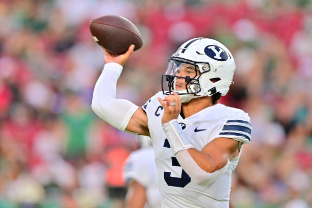 TAMPA, FLORIDA - SEPTEMBER 03: Jaren Hall #3 of the Brigham Young Cougars throws a pass in the first quarter against the South Florida Bulls at Raymond James Stadium on September 03, 2022 in Tampa, Florida. (Photo by Julio Aguilar/Getty Images)