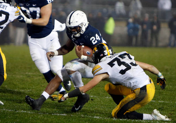 STATE COLLEGE, PA - OCTOBER 27:  Miles Sanders #24 of the Penn State Nittany Lions rushes against Riley Moss #33 of the Iowa Hawkeyes on October 27, 2018 at Beaver Stadium in State College, Pennsylvania.  (Photo by Justin K. Aller/Getty Images)