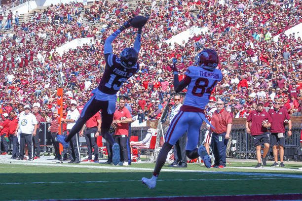 STARKVILLE, MS - OCTOBER 08: Mississippi State Bulldogs cornerback Emmanuel Forbes (13) hauls in an interception during the game between the Mississippi State Bulldogs and the Arkansas Razorbacks on October 8, 2022 at Davis Wade Stadium in Starkville, MS. (Photo by Chris McDill/Icon Sportswire via Getty Images)