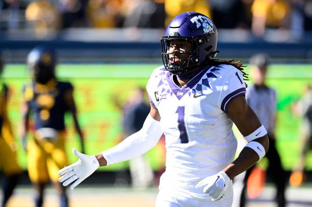 MORGANTOWN, WEST VIRGINIA - OCTOBER 29: Quentin Johnston #1 of the TCU Horned Frogs celebrates after scoring a touchdown against the West Virginia Mountaineers at Mountaineer Field on October 29, 2022 in Morgantown, West Virginia. (Photo by G Fiume/Getty Images)