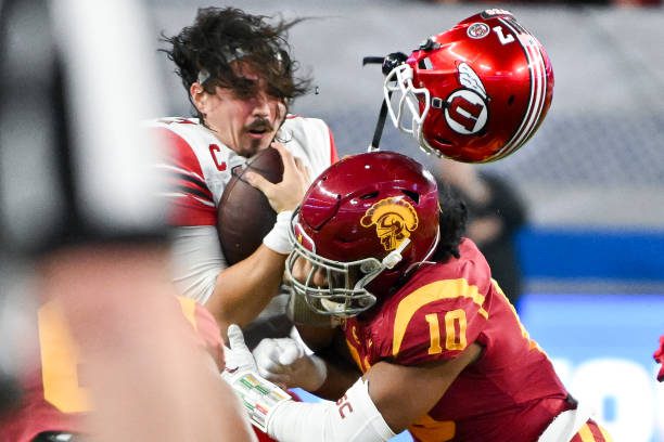 Las Vegas, CA - December 02: USC Trojans linebacker Ralen Goforth, receives a penalty after hitting Utah Utes quarterback Cameron Rising during the third quarter of the Pac-12 Championship at Allegiant Stadium on Friday, Dec. 2, 2022 in Las Vegas, CA.(Wally Skalij / Los Angeles Times via Getty Images)