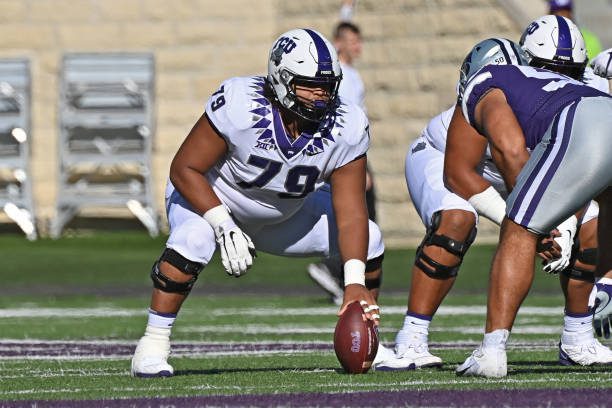 MANHATTAN, KS - OCTOBER 30:  Center Steve Avila #79 of the TCU Horned Frogs gets set to snap the ball during the first half against the Kansas State Wildcats at Bill Snyder Family Football Stadium on October 30, 2021 in Manhattan, Kansas. (Photo by Peter G. Aiken/Getty Images)