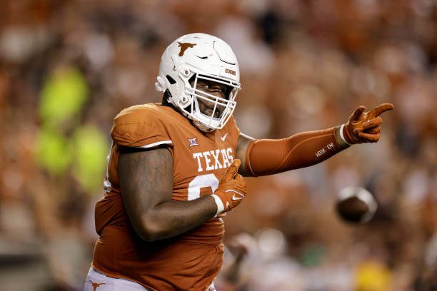 AUSTIN, TEXAS - SEPTEMBER 03: Keondre Coburn #99 of the Texas Longhorns reacts after a tackle in the second half against the Louisiana Monroe Warhawks at Darrell K Royal-Texas Memorial Stadium on September 03, 2022 in Austin, Texas. (Photo by Tim Warner/Getty Images)