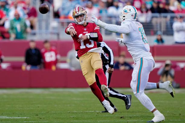 SANTA CLARA, CALIFORNIA - DECEMBER 04: Brock Purdy #13 of the San Francisco 49ers attempts a pass during the second quarter against the Miami Dolphins at Levi's Stadium on December 04, 2022 in Santa Clara, California. (Photo by Thearon W. Henderson/Getty Images)