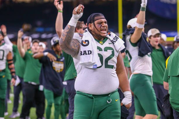 NEW ORLEANS, LA - JANUARY 01: Baylor Bears defensive tackle Siaki Ika (62) cheers with the crowd after the Sugar Bowl between the Ole Miss Rebels and the Baylor Bears on January 1, 2022, at the Caesars Superdome in New Orleans, LA. (Photo by Chris McDill/Icon Sportswire via Getty Images)