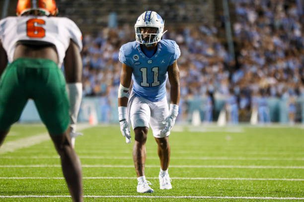 CHAPEL HILL, NC - AUGUST 27: Josh Downs (11) of the North Carolina Tar Heels lines up across from Timothy Williams Jr. (6) of the Florida A&amp;M Rattlers before a play during a football game between the North Carolina Tar Heels and the Florida A&amp;M Rattlers on August 27, 2022, at Kenan Memorial Stadium in Chapel Hill, NC. (Photo by David Jensen/Icon Sportswire via Getty Images)