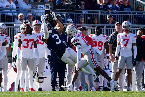 UNIVERSITY PARK, PA - OCTOBER 29: Penn State Nittany Lions Wide Receiver Parker Washington (3) makes a catch with Ohio State Buckeyes Safety Tanner McCalister (15) defending during the second half of the college football game between the Ohio State Buckeyes and the Penn State Nittany Lions on October 29, 2022, at Beaver Stadium in University Park, PA. (Photo by Gregory Fisher/Icon Sportswire via Getty Images)