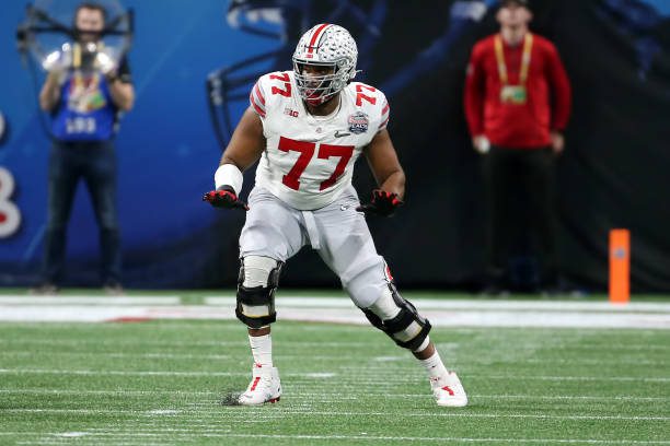 ATLANTA, GA - DECEMBER 31:  Ohio State Buckeyes offensive lineman Paris Johnson Jr. (77) during the college football Playoff Semifinal game at the Chick-fil-a Peach Bowl between the Georgia Bulldogs and the Ohio State Buckeyes on December 31, 2022 at Mercedes-Benz Stadium in Atlanta, Georgia.  (Photo by Michael Wade/Icon Sportswire via Getty Images)