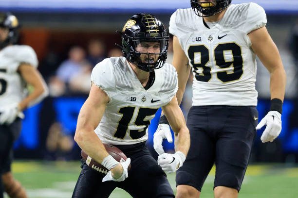 INDIANAPOLIS, INDIANA - DECEMBER 03: Charlie Jones #15 of the Purdue Boilermakers reacts after a play during the first half in the Big Ten Championship against the Michigan Wolverines at Lucas Oil Stadium on December 03, 2022 in Indianapolis, Indiana. (Photo by Justin Casterline/Getty Images)