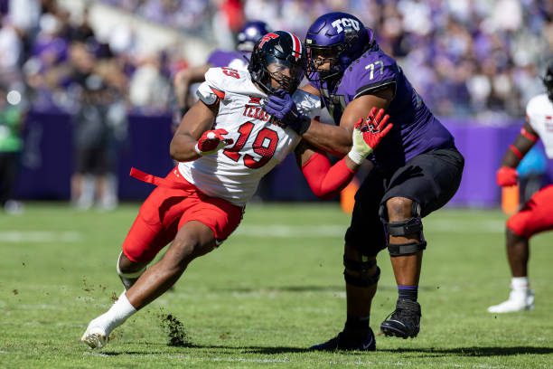 FORT WORTH, TX - NOVEMBER 05: Texas Tech Red Raiders linebacker Tyree Wilson (#19) tries to get around the block of TCU Horned Frogs offensive tackle Brandon Coleman (#77) during the college football game between the Texas Tech Red Raiders and TCU Horned Frogs on November 05, 2022 at Amon G. Carter Stadium in Fort Worth, TX.  (Photo by Matthew Visinsky/Icon Sportswire via Getty Images)