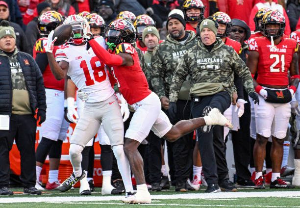 COLLEGE PARK, MD - NOVEMBER 19: Ohio State Buckeyes wide receiver Marvin Harrison Jr. (18) makes a one handed catch against the defense of Maryland Terrapins defensive back Deonte Banks (3) during the Ohio State Buckeyes game versus the Maryland Terrapins on November 19, 2022 at SECU Stadium in College Park, MD.  (Photo by Mark Goldman/Icon Sportswire via Getty Images)