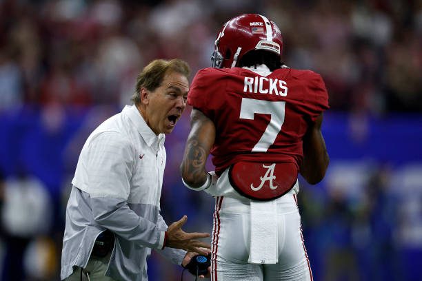 NEW ORLEANS, LOUISIANA - DECEMBER 31: Head coach Nick Saban of the Alabama Crimson Tide talks with Eli Ricks #7 of the Alabama Crimson Tide during the Allstate Sugar Bowl at Caesars Superdome on December 31, 2022 in New Orleans, Louisiana. (Photo by Chris Graythen/Getty Images)