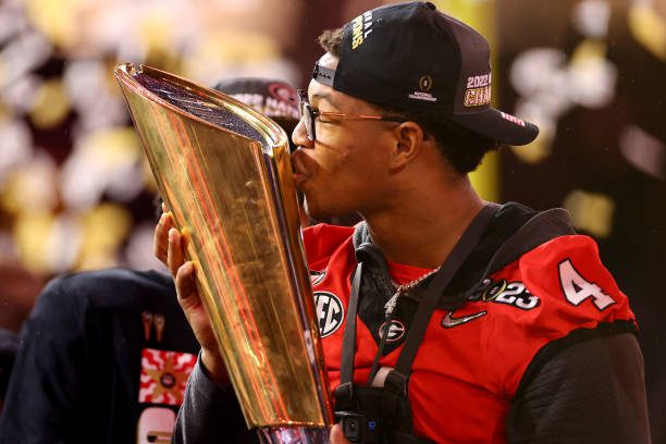 INGLEWOOD, CA - JANUARY 09: Nolan Smith #4 of the Georgia Bulldogs celebrates the Bulldogs victory over the TCU Horned Frogs during the College Football Playoff National Championship held at SoFi Stadium on January 9, 2023 in Inglewood, California. (Photo by Jamie Schwaberow/Getty Images)