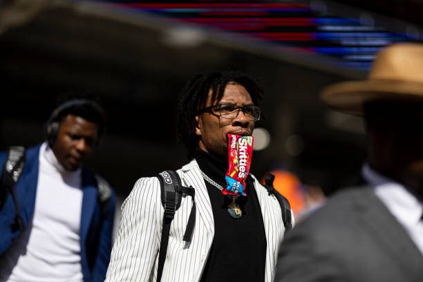 GAINESVILLE, FLORIDA - NOVEMBER 12: Anthony Richardson #15 of the Florida Gators arrives carrying a bag of skittles before the start of a game against the South Carolina Gamecocks at Ben Hill Griffin Stadium on November 12, 2022 in Gainesville, Florida. (Photo by James Gilbert/Getty Images)