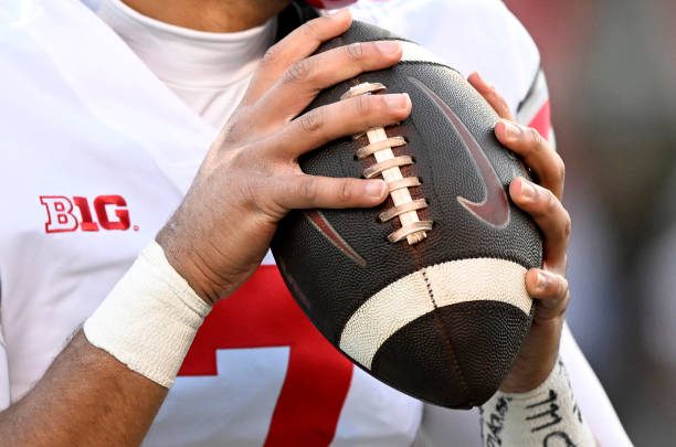COLLEGE PARK, MARYLAND - NOVEMBER 19: C.J. Stroud #7 of the Ohio State Buckeyes holds a Nike football during the game against the Maryland Terrapins at SECU Stadium on November 19, 2022 in College Park, Maryland. (Photo by G Fiume/Getty Images)