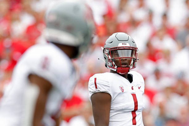 MADISON, WISCONSIN - SEPTEMBER 10: Cameron Ward #1 of the Washington State Cougars before the snap against the Wisconsin Badgers at Camp Randall Stadium on September 10, 2022 in Madison, Wisconsin. (Photo by John Fisher/Getty Images)