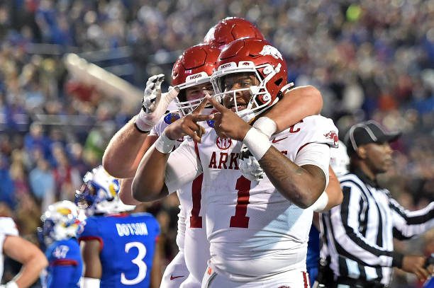 MEMPHIS, TENNESSEE - DECEMBER 28: KJ Jefferson #1 of the Arkansas Razorbacks reacts after scoring a touchdown during the first half of the Autozone Liberty Bowl game against the Kansas Jayhawks at Simmons Bank Liberty Stadium on December 28, 2022 in Memphis, Tennessee. (Photo by Justin Ford/Getty Images)