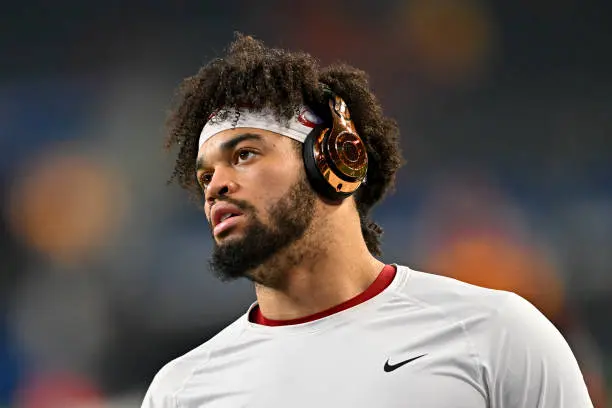 ARLINGTON, TEXAS - JANUARY 02: Quarterback Caleb Williams #13 of the USC Trojans looks on before the Goodyear Cotton Bowl Classic football game against the Tulane Green Wave at AT&amp;T Stadium on January 02, 2023 in Arlington, Texas. (Photo by Alika Jenner/Getty Images)