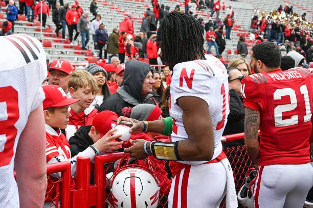 LINCOLN, NE - APRIL 22: Quarterback Jeff Sims #14 of Nebraska Cornhuskers signs autographs after the contest at Memorial Stadium on April 22, 2023 in Lincoln, Nebraska. (Photo by Steven Branscombe/Getty Images)