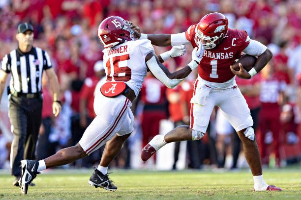 FAYETTEVILLE, ARKANSAS - OCTOBER 1: K.J. Jefferson #1 of the Arkansas Razorbacks is tackled by Dallas Turner #15 of the Alabama Crimson Tide at Donald W. Reynolds Razorback Stadium on October 1, 2022 in Fayetteville, Arkansas. The Crimson Tide defeated the Razorbacks 49-26. (Photo by Wesley Hitt/Getty Images)
