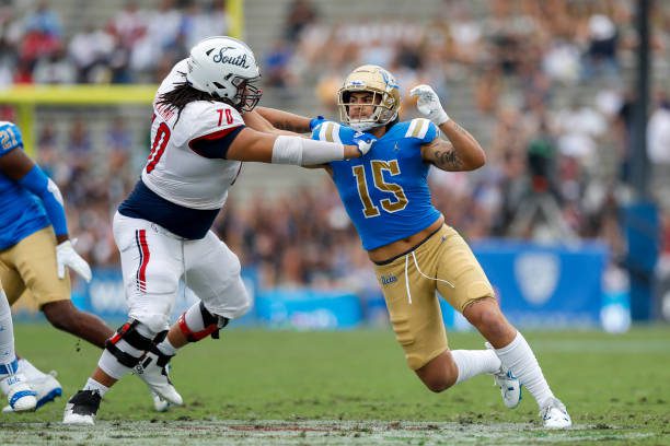 PASADENA, CA - SEPTEMBER 17: UCLA Bruins linebacker Laiatu Latu (15) rushes the passer and gets blocked by South Alabama Jaguars offensive lineman Adrein Strickland (70) during a college football game between the South Alabama Jaguars and the UCLA Bruins on September 17, 2022, at the Rose Bowl Stadium in Pasadena, CA. (Photo by Jordon Kelly/Icon Sportswire via Getty Images)