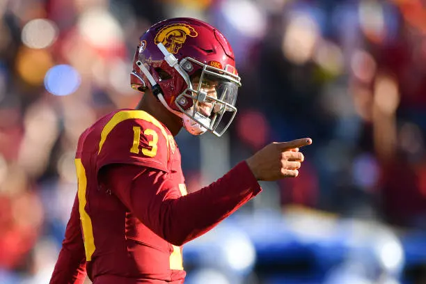 LOS ANGELES, CA - AUGUST 26: USC Trojans quarterback Caleb Williams (13) celebrates after a touchdown pass during a game between the San Jose State Spartans and the USC Trojans on August 26, 2023, at Los Angeles Memorial Coliseum in Los Angeles, CA. (Photo by Brian Rothmuller/Icon Sportswire via Getty Images)