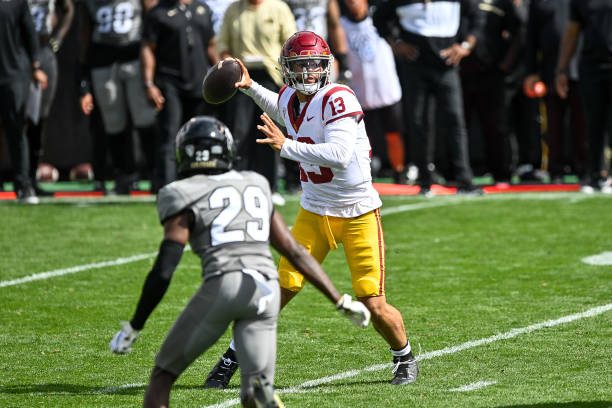 BOULDER, CO - SEPTEMBER 30:  Quarterback Caleb Williams #13 of the USC Trojans passes for a third quarter touchdown against the Colorado Buffaloes at Folsom Field on September 30, 2023 in Boulder, Colorado. (Photo by Dustin Bradford/Getty Images)