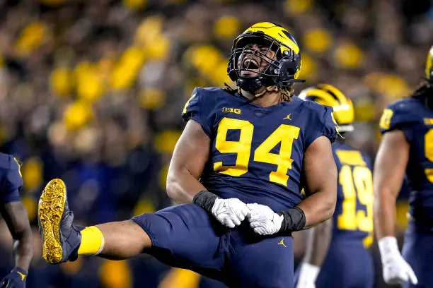 ANN ARBOR, MICHIGAN - OCTOBER 29: Kris Jenkins #94 of the Michigan Wolverines reacts against the Michigan State Spartans during the fourth quarter at Michigan Stadium on October 29, 2022 in Ann Arbor, Michigan. (Photo by Nic Antaya/Getty Images)