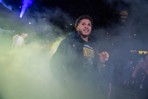 ANN ARBOR, MICHIGAN - JANUARY 13: Blake Corum #2 of the Michigan Wolverines walks out the tunnel before the National Championship Celebration at Crisler Center on January 13, 2024 in Ann Arbor, Michigan. (Photo by Aaron J. Thornton/Getty Images)