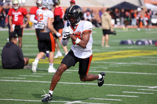 MOBILE, AL - FEBRUARY 01: National wide receiver Javon Baker of Central Florida (82) during the National team practice for the Reese's Senior Bowl on February 31, 2024 at Hancock Whitney Stadium in Mobile, Alabama.  (Photo by Michael Wade/Icon Sportswire via Getty Images)