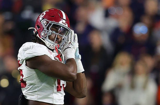 AUBURN, ALABAMA - NOVEMBER 25:  Dallas Turner #15 of the Alabama Crimson Tide reacts after a defensive stop against the Auburn Tigers during the fourth quarter at Jordan-Hare Stadium on November 25, 2023 in Auburn, Alabama. (Photo by Kevin C. Cox/Getty Images)