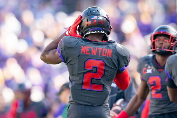 FORT WORTH, TX - NOVEMBER 18:TCU Horned Frogs cornerback Josh Newton (2) adjusts his helmet during a college football game between the Baylor Bears and the TCU Horned Frogs on November 18, 2023 at Amon G. Carter Stadium in Fort Worth, TX.  (Photo by Chris Leduc/Icon Sportswire via Getty Images)