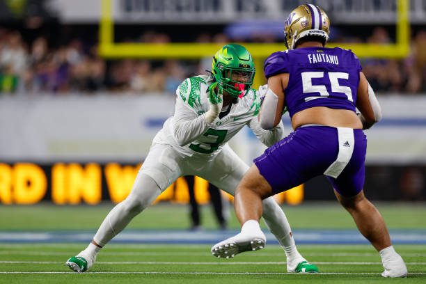 LAS VEGAS, NEVADA - DECEMBER 1: Brandon Dorlus #3 of the Oregon Ducks works against Troy Fautanu #55 of the Washington Huskies in the second half during the Pac-12 Championship game at Allegiant Stadium on December 1, 2023 in Las Vegas, Nevada. (Photo by Brandon Sloter/Image Of Sport/Getty Images)