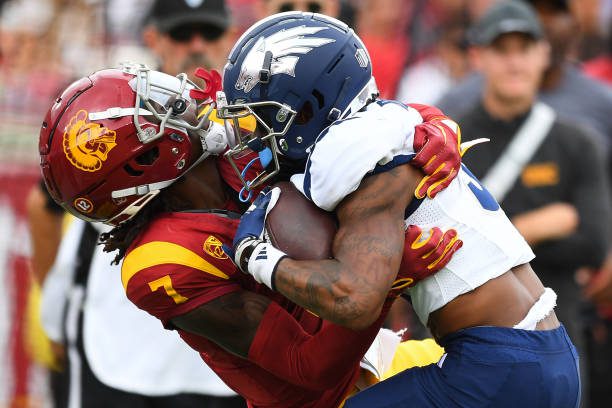 LOS ANGELES, CA - SEPTEMBER 02: USC Trojans safety Calen Bullock (7) makes a tackle during a game between the Nevada Wolf Pack and the USC Trojans on September 2, 2023, at Los Angeles Memorial Coliseum in Los Angeles, CA. (Photo by Brian Rothmuller/Icon Sportswire via Getty Images)