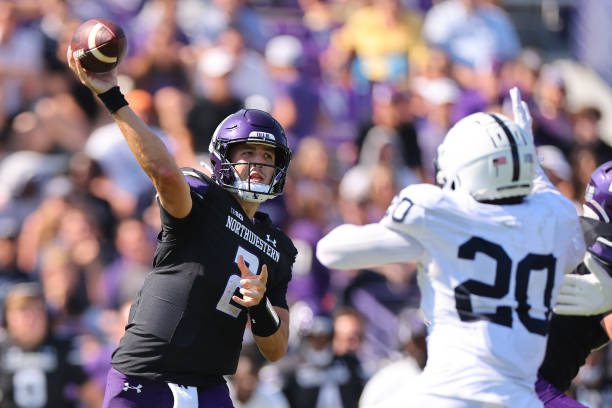 EVANSTON, ILLINOIS - SEPTEMBER 30: Ben Bryant #2 of the Northwestern Wildcats throws a pass against the Penn State Nittany Lions during the second half at Ryan Field on September 30, 2023 in Evanston, Illinois. (Photo by Michael Reaves/Getty Images)