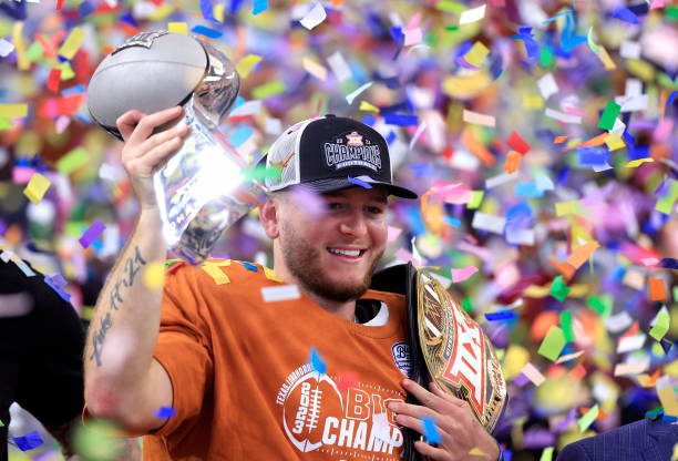 ARLINGTON, TX - DECEMBER 2: Quarterback Quinn Ewers #3 of the Texas Longhorns celebrates after Texas defeated the Oklahoma State Cowboys in the Big 12 Championship at AT&amp;T Stadium on December 2, 2023 in Arlington, Texas.  (Photo by Ron Jenkins/Getty Images)