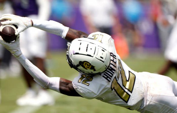 FORT WORTH, TX - SEPTEMBER 2: Travis Hunter #12 of the Colorado Buffaloes dives for a pass against the TCU Horned Frogs during the first half at Amon G. Carter Stadium on September 2, 2023 in Fort Worth, Texas. (Photo by Ron Jenkins/Getty Images)