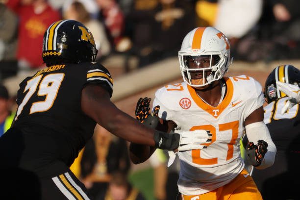 COLUMBIA, MO - NOVEMBER 11: Tennessee Volunteers defensive lineman James Pearce Jr. (27) rushes against Missouri Tigers offensive lineman Armand Membou (79) in the second quarter of an SEC football game between the Tennessee Volunteers and Missouri Tigers on Nov 11, 2023 at Memorial Stadium in Columbia, MO. (Photo by Scott Winters/Icon Sportswire via Getty Images)