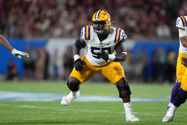 ORLANDO, FL - SEPTEMBER 03: LSU Tigers offensive lineman Emery Jones Jr. (50) looks to block an incoming defensive lineman during the Camping World Kickoff game between the LSU Tigers and the Florida State Seminoles, on Sunday, September 3, 2023 at Camping World Stadium in Orlando, Fla. (Photo by Peter Joneleit/Icon Sportswire via Getty Images)