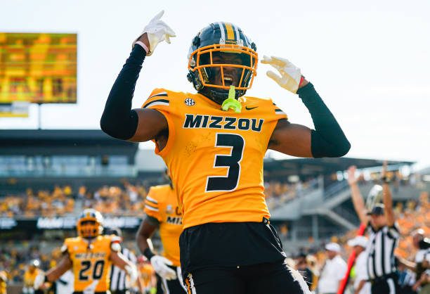 COLUMBIA, MO - OCTOBER 22: Luther Burden III #3 of the Missouri Tigers celebrates after scoring a touchdown during the first half against the Vanderbilt Commodores at Faurot Field/Memorial Stadium on October 22, 2022 in Columbia, Missouri. (Photo by Jay Biggerstaff/Getty Images)