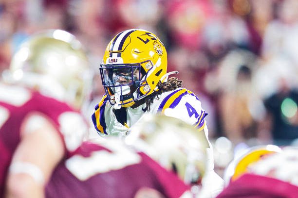 ORLANDO, FL - SEPTEMBER 03: LSU Tigers linebacker Harold Perkins Jr. (4) lines up for a play during the Camping World Kickoff Game between the LSU Tigers and the Florida State Seminoles on September 03, 2023, at Camping World Stadium in Orlando, FL. (Photo by John Korduner/Icon Sportswire via Getty Images)