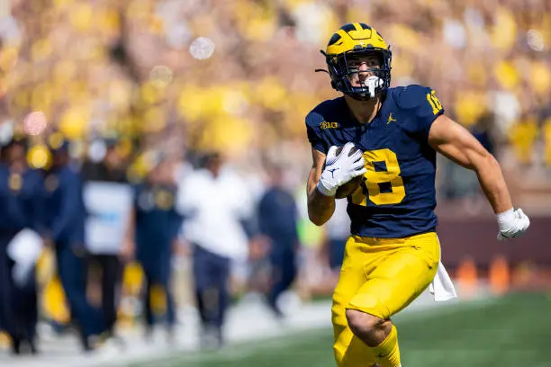 ANN ARBOR, MI - SEPTEMBER 23: Michigan Wolverines tight end Colston Loveland (18) heads for the end zone during the college men's football game between the Rutgers Scarlet Knights and the Michigan Wolverines on September 23, 2023 at Michigan Stadium in Ann Arbor, MI. (Photo by Bob Kupbens/Icon Sportswire via Getty Images)